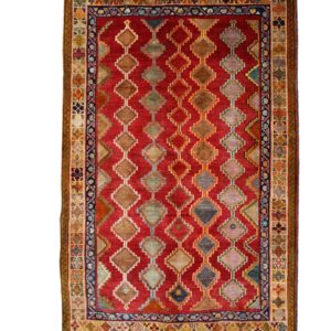 Persian qashqai rug wool on wool , with allover diamond shapes.