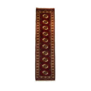 Turkoman Runner with Gul motif . Red and cream background.