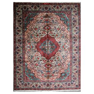 Persian Tabriz Rug with signed by the weaver. Soft wool with cream background.