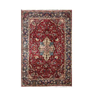 Persian Fine and old Isfahan rug with central floral medallion.